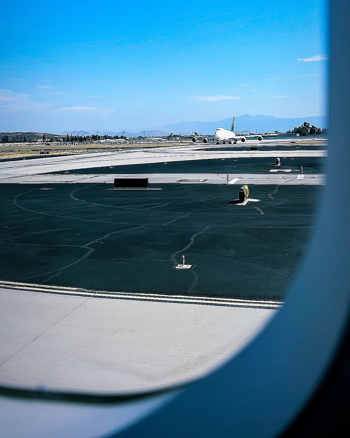Runway view out of my airplane window.